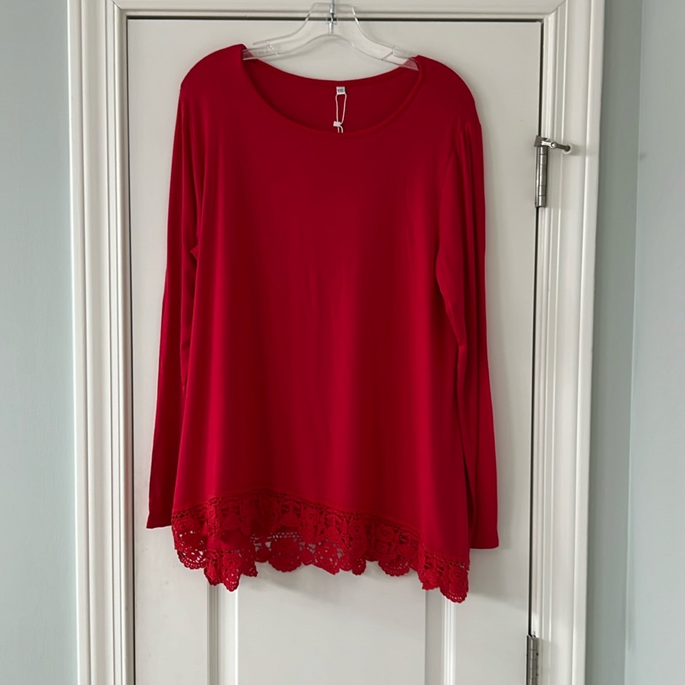 Red long sleeve top with lace on the bottom